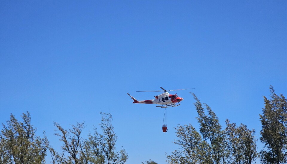 Arkivfoto av et brannhelikopter på vei ut for å hente vann på Gran Canaria.