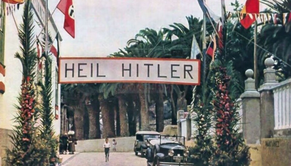 Et banner ønsket tyske seilere velkommen til Puerto de la Cruz på Tenerife.